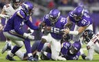 Minnesota Vikings defensive end Ifeadi Odenigbo (95) recovered a Chicago Bears quarterback Mitchell Trubisky (10) in the fourth quarter .