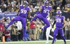 Minnesota Vikings defensive end Danielle Hunter, left, and Minnesota Vikings defensive end Everson Griffen celebrated their defense in the first quart
