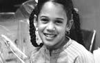 This undated photo provided by the Kamala Harris campaign in April 2019 shows her as a child at her mother’s lab in Berkeley, Calif.