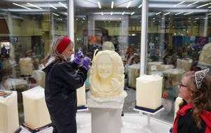 Artist Linda Christensen carved a solid block of butter in the Dairy Building at the Minnesota State Fair in 2018.
