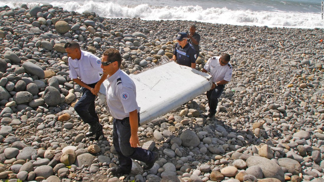 On July 29, police carry a piece of &lt;a href=&quot;http://www.cnn.com/2015/07/30/world/gallery/debris-found-reunion-island/index.html&quot; target=&quot;_blank&quot;&gt;debris on Reunion Island,&lt;/a&gt; a French territory in the Indian Ocean. A week later, authorities confirmed that the debris was from the missing flight.