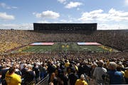 It is hard to imagine 100,000 people in attendance at a college football game this fall, such as when Michigan played host to Army last September. But
