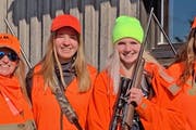 North of Hibbing this weekend, during the first statewide youth deer hunt, Nancy Burkes, left, and Hillarie Glad, second from left, hosted Leah Bloomq