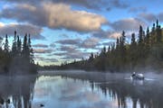 Boundary Waters Journal editor and publisher Stu Osthoff embraces his work as a BWCA guide, leading anglers to hot spots for walleyes and trophy small