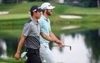 Matthew Wolff and Collin Morikawa talk and share a laugh as they walk down the 17th fairway during the final round of the 2019 3M Open. Morikawa won t