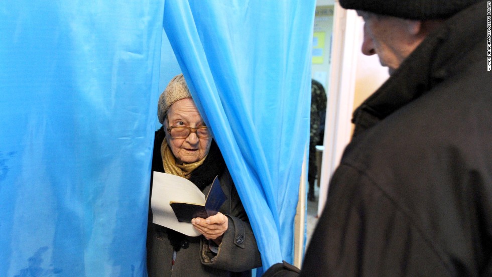 A woman leaves a voting booth in Sevastopol on March 16. &lt;a href=&quot;http://www.cnn.com/2014/02/24/world/gallery/ukraine-in-transition/index.html&quot; target=&quot;_blank&quot;&gt;See the crisis in Ukraine before Crimea voted&lt;/a&gt;