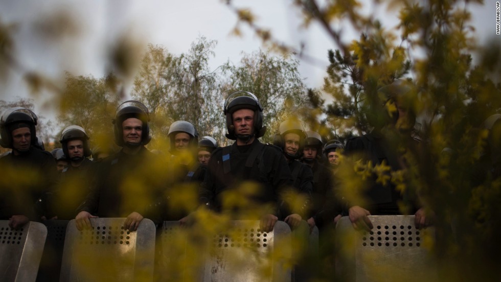Ukrainian riot police officers stand guard during a pro-Ukrainian demonstration in Donetsk on April 17.