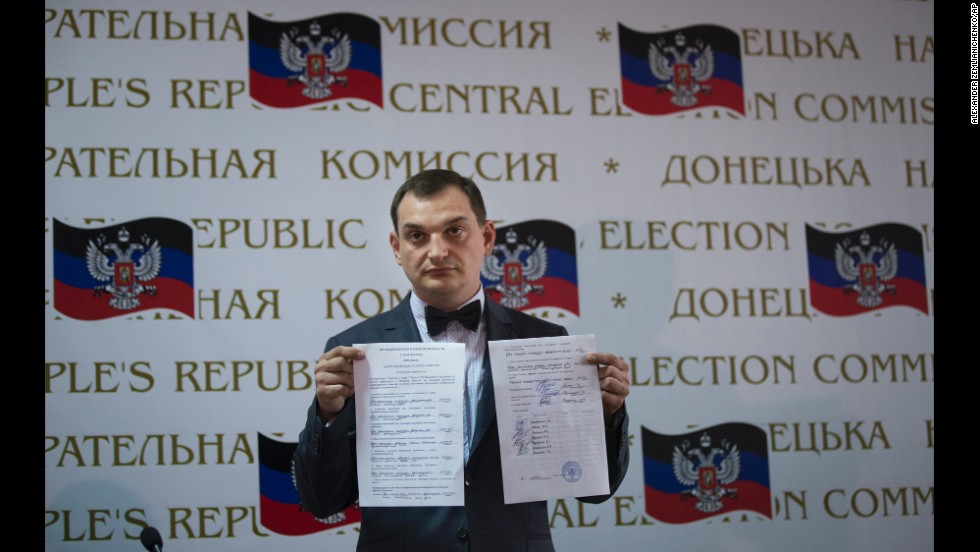 Roman Lyagin, a member of a rebel election commission, shows referendum results to journalists at a May 12 news conference in Donetsk. Pro-Russian separatists staged the referendum asking residents in the Donetsk and Luhansk regions whether they should declare independence from Ukraine.  