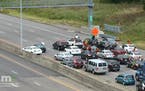 A convoy of vehicles driving at a snail’s pace blocked all westbound lanes on I-94 between St. Paul and Minneapolis during Wednesday evening's commu