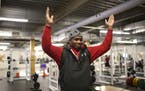 Jashon Cornell made the Ohio State University "O" sign for a couple of his former coaches during a 2015 visit to the weight room at Cretin-Derham Hall