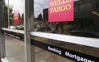 An advertisement for home mortgages is shown at a Wells Fargo Bank in Menlo Park, Calif., Thursday, July 8, 2010. Mortgage rates fell for the second s