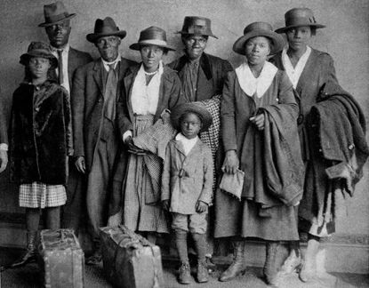 Scott and Violet Arthur arrive with their family at Chicago's Polk Street Depot on Aug. 30, 1920, two months after their two sons were lynched in Paris, Texas. The picture has become an iconic symbol of the Great Migration.