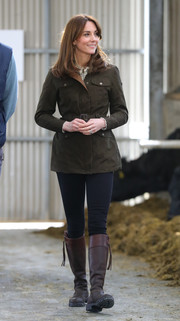Kate Middleton geared up for the outdoors in a brown utility jacket by Dubarry while visiting the Teagasc Animal & Grassland Research Centre in Ireland.