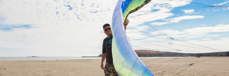 Man with kite at Doran Beach