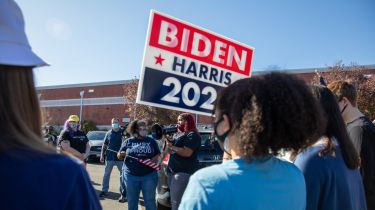 Supporters of President-elect Joe Biden gather Sunday at