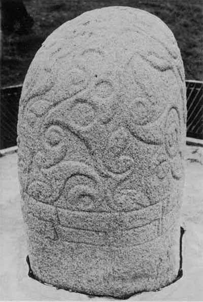 Turoe Stone (Co. Galway). Made of granite. About 1 meter high.