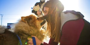 Melissa Buescher gives a kiss to her chow Leo after being reunited with him on Friday, Nov. 20, 2020, at Yellowstone Valley Animal Shelter in Billings