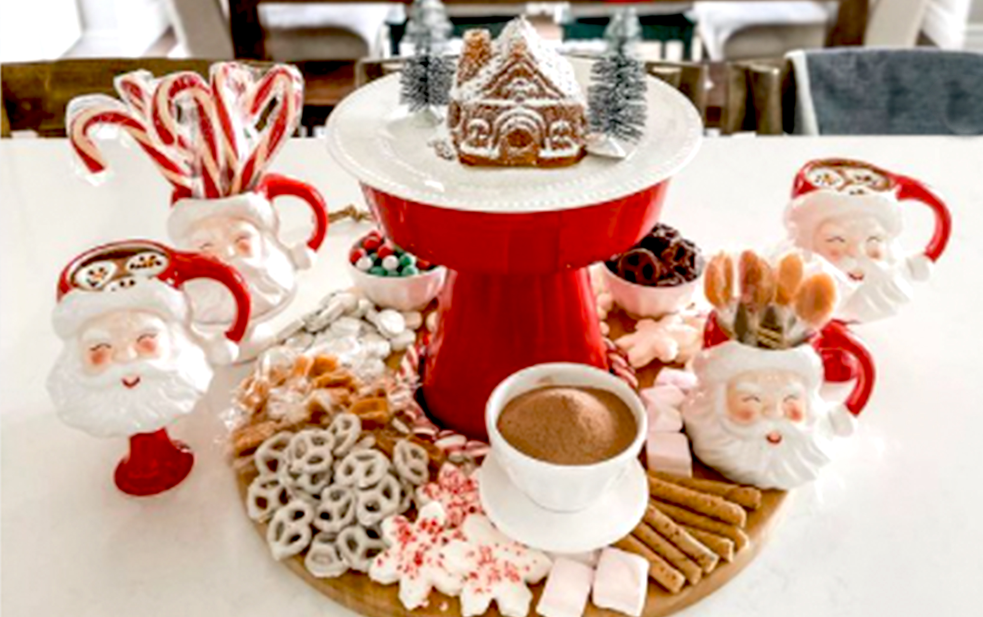 Hot chocolate charcuterie board with Santa mugs