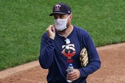 Twins manager Rocco Baldelli wore a mask during practice Friday, the team's first day back after nearly four months away because of the COVID-19 pande