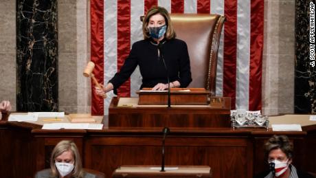 Speaker of the House Nancy Pelosi, D-Calif., gavels in the final vote of the impeachment of President Donald Trump, for his role in inciting an angry mob to storm the Congress last week, at the Capitol in Washington, Wednesday, Jan. 13, 2021. (AP Photo/J. Scott Applewhite)