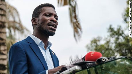 Musician-turned-politician Robert Kyagulanyi, also known as Bobi Wine, speaks during a press conference at his home in Magere, Uganda, on January 15, 2021. - Ugandan opposition leader Bobi Wine on January 15, 2021 claimed victory in a presidential election, rejecting early results which gave President Yoweri Museveni a wide lead as a &quot;joke&quot;. (Photo by Sumy SADRUNI / AFP) (Photo by SUMY SADRUNI/AFP via Getty Images)