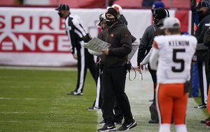 Cleveland Browns head coach Kevin Stefanski, center, watches from the sideline during the second half on Sunday.