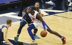 Pistons forward Jerami Grant drove against Timberwolves guard Ricky Rubio during the first quarter Wednesday.