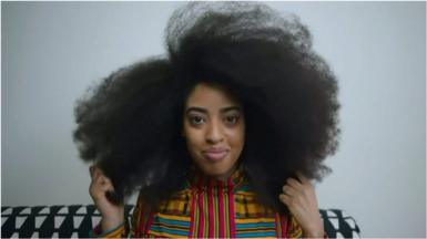 Simone Williams sees her hair, which measures nearly 1.5m in circumference, as a symbol of pride