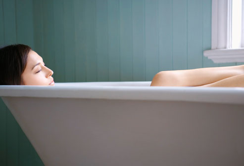Woman Relaxing In Tub