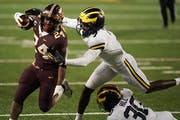 Gophers running back Mohamed Ibrahim has 10 touchdowns in three games, including this one against Michigan.