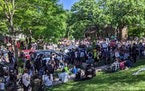A crowd gathered outside the home of Hennepin County Attorney Mike Freeman in May 2020.