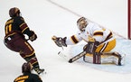 Gophers goalie Jared Moe made a save against Arizona State in January.