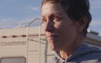 This image released by Searchlight Pictures shows Frances McDormand in a scene from the film “Nomadland.” (Searchlight Pictures via AP)