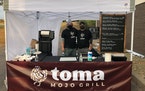 Toma Mojo Grill co-owners Paul Backer, left, and Michael Knox.