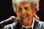 FILE - In this Jan. 12, 2012, file photo, Bob Dylan performs in Los Angeles. Universal Music Publishing Group is buying legendary singer Bob Dylan’s