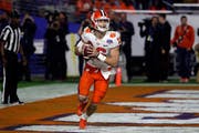 Clemson quarterback Trevor Lawrence, expecting a huge NFL payday, is pushing to play this season.
