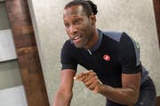 Caesar Russell, cycling instructor for Wellbeats, a St. Louis Park-based firm that offers videos and other online fitness programs.