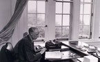 Historical photo of author Sinclair  Lewis writing in the study of his Duluth home in 1944.   Original photo shot by Minneapolis Star-Journal photogra