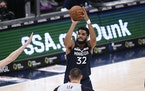 Wolves center Karl-Anthony Towns (shown against the Wizards in February) is shooting only 26% from three-point range over his past six games. He’s b