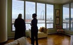 Holly Holt showed a third-floor condo on Friday to Karen Elshazly of Orono. The Zenith Condominium, on S. 2nd Street near the Guthrie Theater, overloo