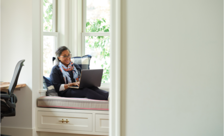 Image for: Woman working in a home office. Microsoft 365 Business Premium Female, home office, owner, collaboration, remote work (1)