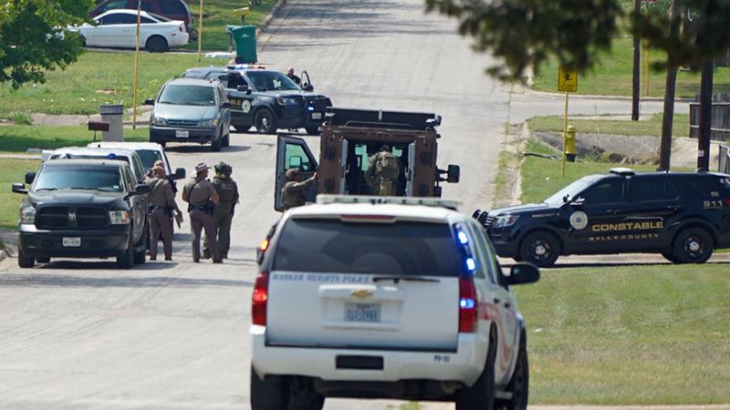 Gunfire was reported Wednesday in a neighborhood near two local schools where authorities were...