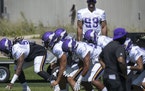 Injured Danielle Hunter (99) watched a practice during training camp in August.  