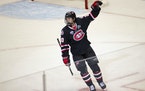 St. Cloud State forward Nolan Walker celebrated after scoring the game-winning goal with under a minute to play in regulation on Thursday.