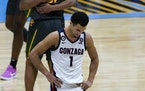 Gonzaga guard Jalen Suggs (1) walks on the court at the end of the championship game against Baylor.