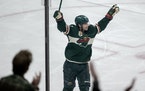Kevin Fiala (22) of the Minnesota Wild celebrated a goal in the third period. Fiala had a hat trick in the game.