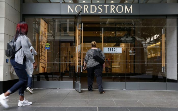 Shoppers enter Nordstrom's flagship store in
