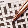 Crossword puzzle and pen