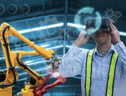 A person using a VR device in a manufacturing setting