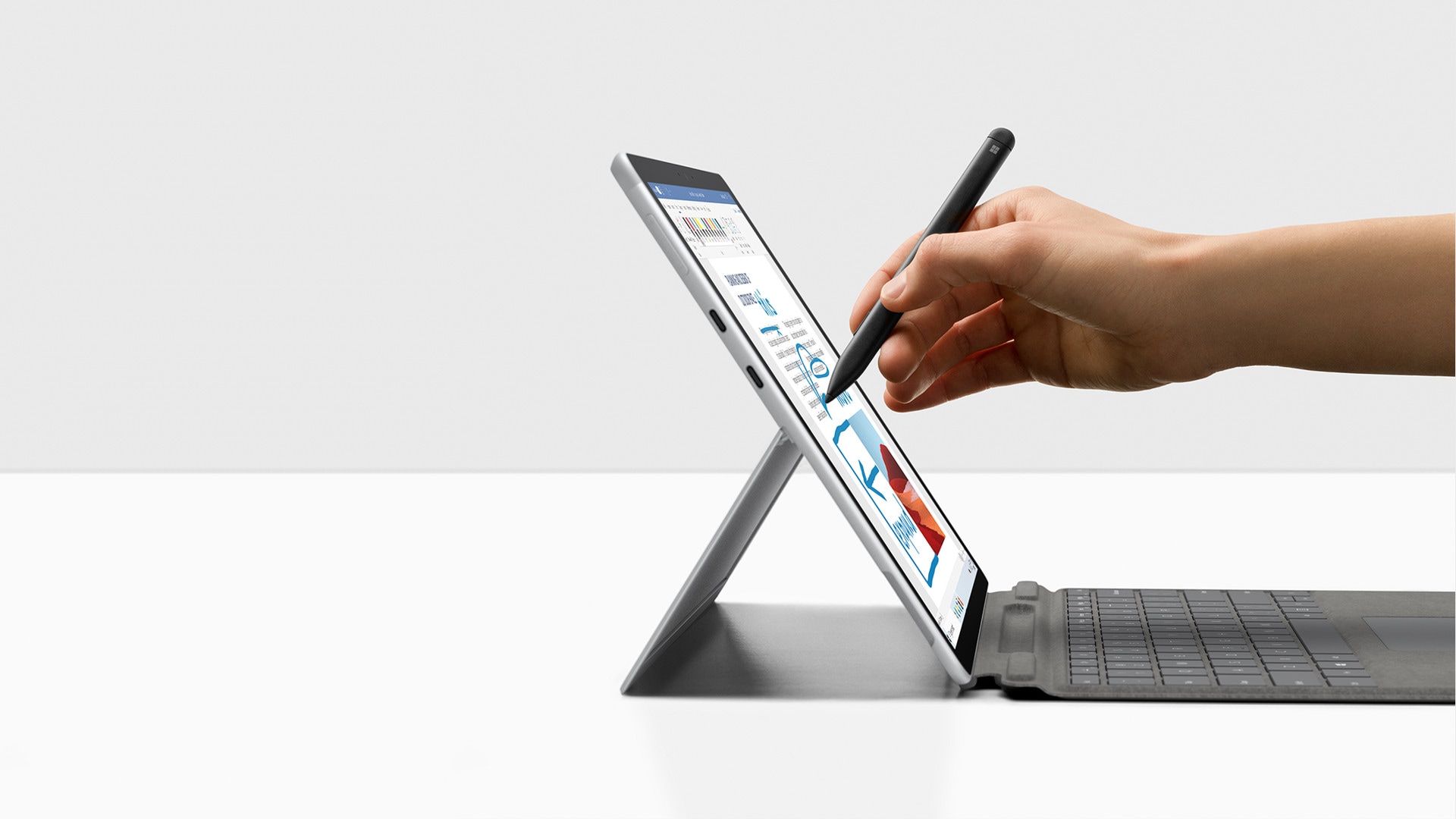 Surface Pro X in Platinum with Surface Slim Pen